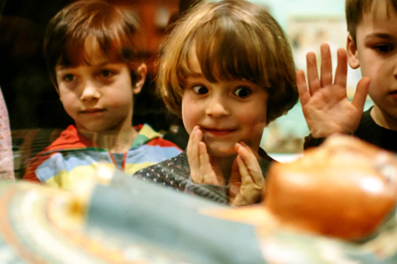 Children looking at a mummy in Egypt galleries