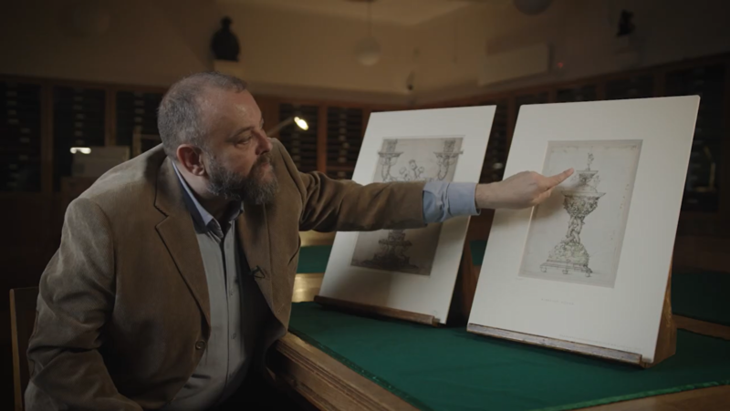 Curator Matthew Winterbottom points at an artwork in the Ashmolean's Western Art Print Room